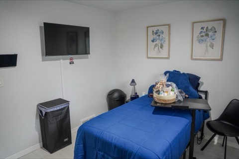 A resident bedroom with television