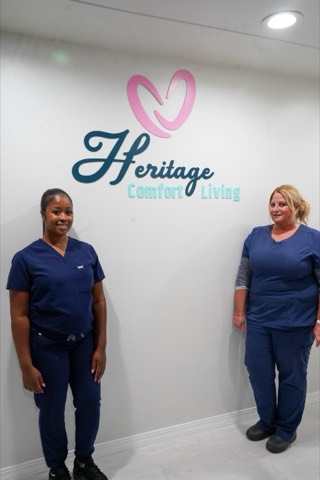 Members of the Heritage Comfort Living Homes care team