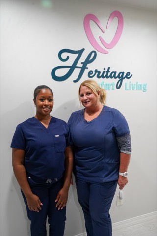 Members of the Heritage Comfort Living Homes care team