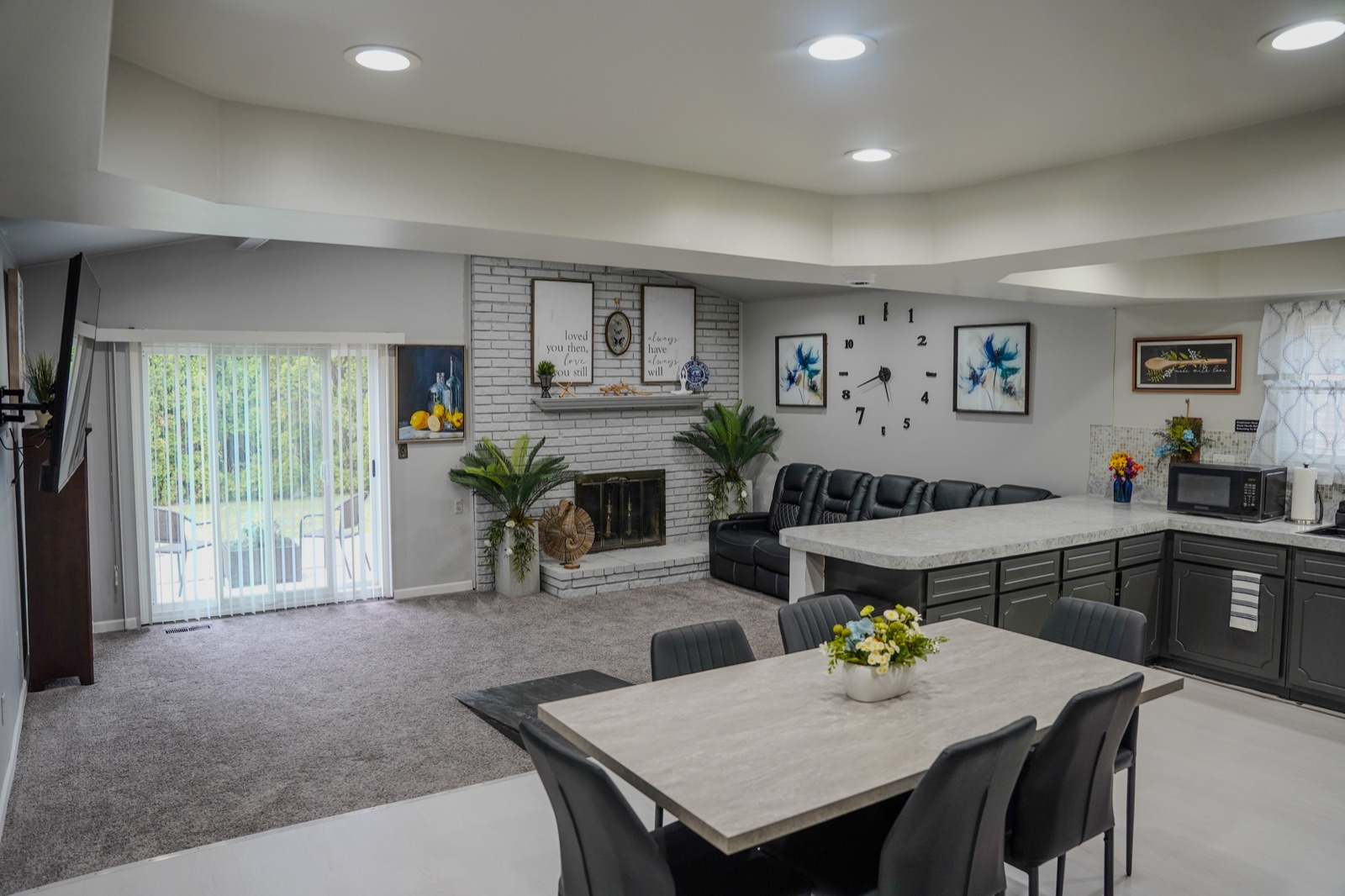 Shared living, dining, and kitchen space at Heritage Comfort Living Homes
